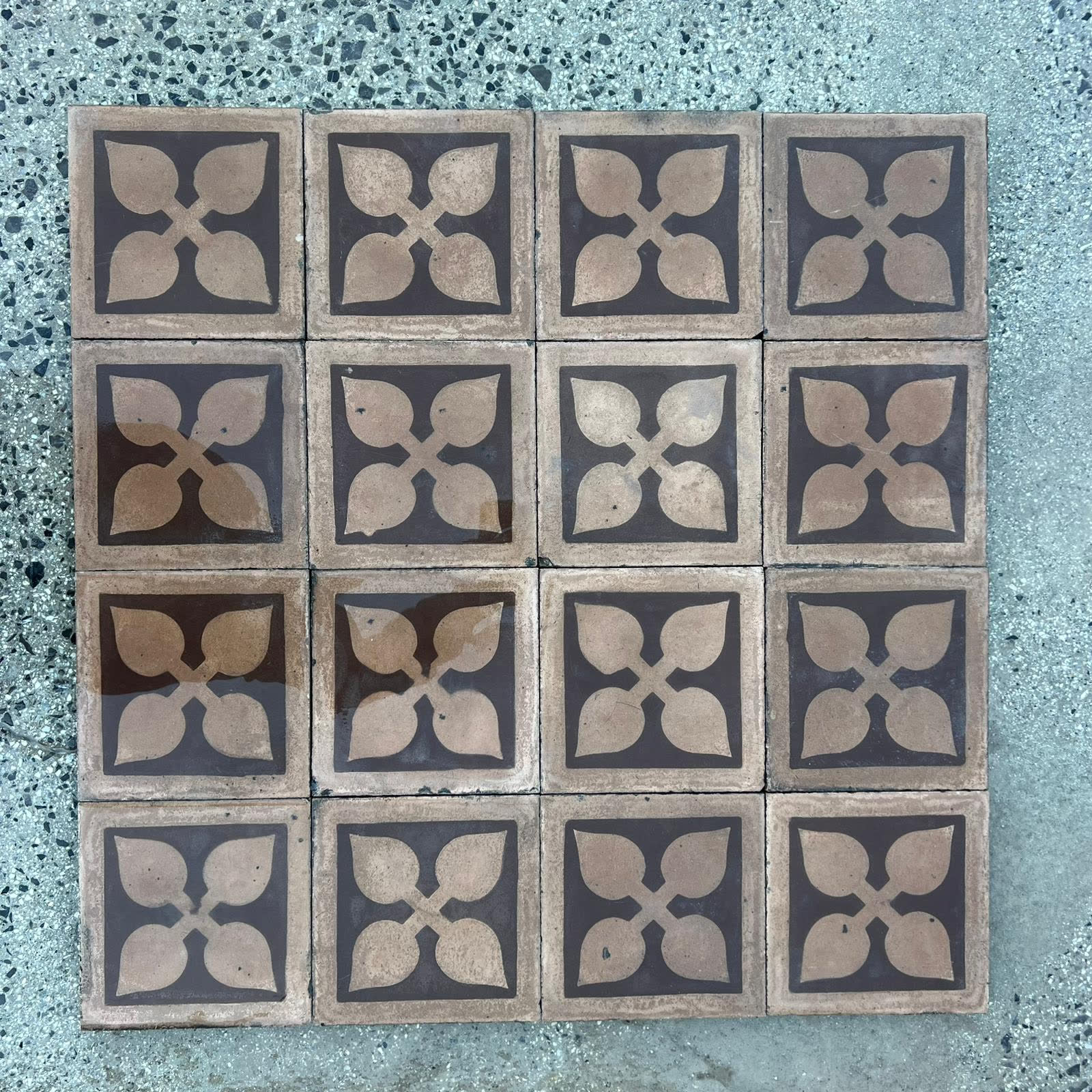 Antique patterned floor tiles